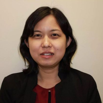 Dr Ney Yee Thwin smiles at the camera. She has medium length dark hair