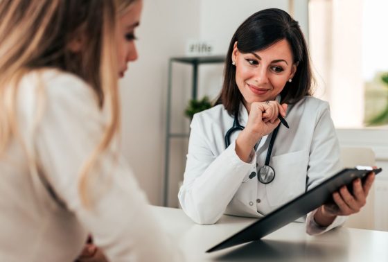 doctor and woman discussing results